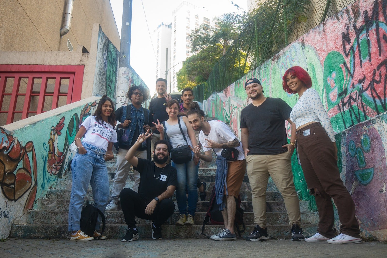 A Group of People Standing on a Concrete Stairs
